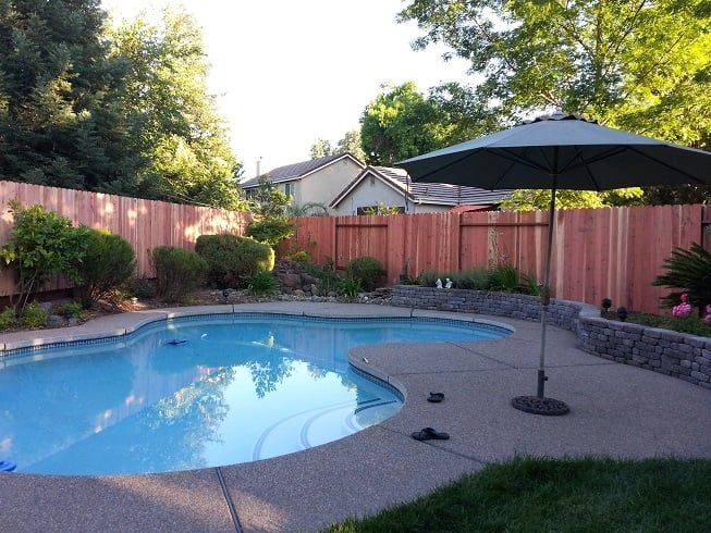 Redwood fence around a swimming pool